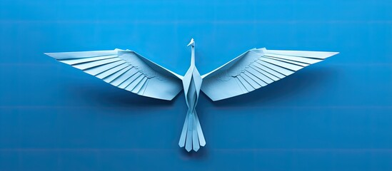 Wall Mural - Origami crane with copy space image on white backdrop.
