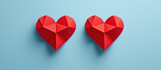 Sticker - Top down view featuring two red origami hearts set on a white background specifically designed for Valentine's Day gift cards, with ample copy space for adding text or images.