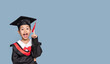 © Cheangchai - A girl wears a graduation gown. The girl graduated.