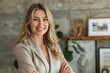 © mattegg - Cheerful Real Estate Agent Portrait: Female Professional Smiling
