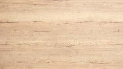 a wooden surface with a grainy texture. the wood is brown and has a natural look. the surface is smo