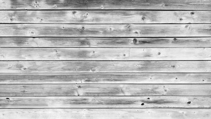 Wall Mural - A wooden board with a grainy texture and a few holes. The board is white and has a rustic feel to it
