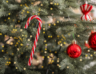 Christmas candy cane ornament. Merry holiday winter xmas tree with new year happy red gift. Noel ball element concept. Season gold fir present object. Sale festive december