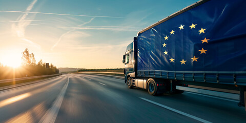 Truck with European Union flag on highway. Concept of international transportation, European pride, logistics, road transport, global trade