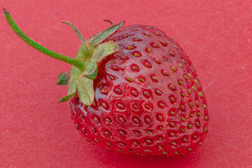 Ripe red delicious strawberries macro shooting several pieces and single