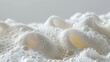 © Alpha - Close-up view of dense soap foam, with tiny, shimmering bubbles against a pure white background