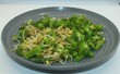 © adi yuhanggana - green vegetables and sprouts in a plate