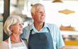 © DL/peopleimages.com - Senior couple, smile and business owner with thinking, working and coffee shop with manager. Vision, entrepreneur and elderly people with idea and proud from cafe service and store with staff