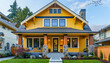 © Hasnain Arts - Sophisticated Craftsman Style New Construction Lemon Yellow House Featuring Modern Design in a Vibrant Urban Neighborhood