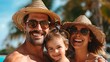 © Vivid Canvas - Brazilian family. Brazil. Families of the World. A cheerful family with a father, mother, and young daughter wearing sun hats and sunglasses smile joyously on a sunny beach vacation . #fotw