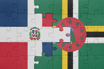 Wall Mural - puzzle with the colourful national flag of dominica and flag of dominican republic .