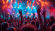 © Katrin_Primak - A vibrant summer music festival crowd with hands in the air, stage lights in the background