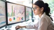 © buraratn - Financial analyst reviewing stock market graphs and data analytics reports on a desktop computer