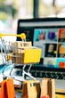 © dekreatif - Optimized online shopping journey Colorful boxes adjacent to open laptop in shopping cart