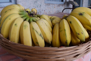 close up shot of yellow bananas in a basket clicked in Pune India