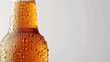 © Abdul's Collection - A cold bottle of amber beer with droplets of condensation, set on a solid white background, highlighting the crisp and refreshing appeal.