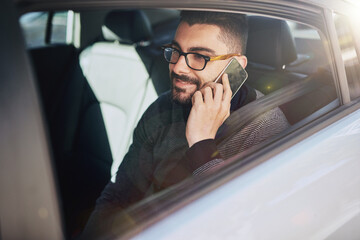 Aufkleber - Phone call, man and glasses in car for business trip, communication and private driver in city. Talking, smartphone and male designer in taxi for back seat, travel and commute by window for work
