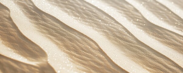 Wall Mural - Desert sand. Close-up view of desert sand with subtle white hues color, showing delicate ripples and textures. The soft lighting accentuates intricate patterns, creating a serene captivating scene