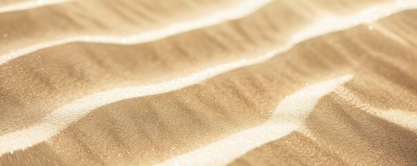 Wall Mural - Desert sand. Close-up view of desert sand with subtle white hues color, showing delicate ripples and textures. The soft lighting accentuates intricate patterns, creating a serene captivating scene