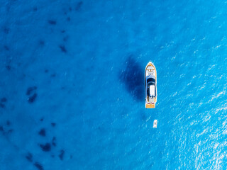 Wall Mural - summertime vacation. drone view on the yacht. sail yacht on the sea as a background. .sea and waves 