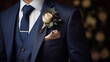 © Musyarofah - Dressed man ready for wedding, wearing a beautiful celebration suit with flowers in a pocket. generative ai