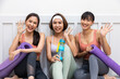 © Akarawut - Group of Asian female friends talking together after exercise in yoga class sport club for healthy and fitness lifestyle concept