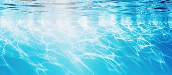 Blue pool water with sun reflections background. Creative banner. Copyspace image
