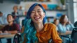© Bi - Happy disabled asian woman with blue hair in wheelchair laughing with team of colleagues in the office Smiling lesbian with disability celebrating pride month Diversity equality  inclusion