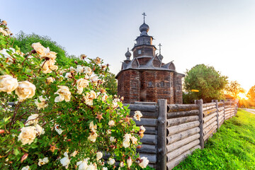 Wall Mural - Suzdal, Vladimir region, Russia, Golden Ring - View of the Church of the Transfiguration of the Savior from the village of Kozlyatevo in the ancient Russian city of Suzdal. A summer evening.