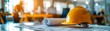 © Sunshine - Architectural Workspace with Yellow Hard Hat and Blueprints in Modern Office Setting with Sunlight Streaming Through Windows