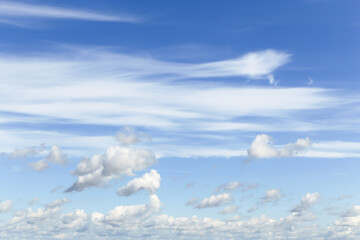 Wall Mural - Beautiful epic soft gentle blue sky with many white cirrus and fluffy clouds background texture