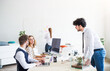 © Halfpoint - Young group of colleagues working on a new project together in a startup company office. Working in co-working space.