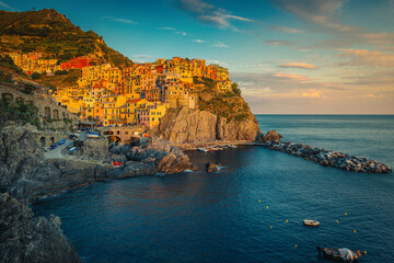 Mediterranean village with colorful seaside houses on the cliffs, Manarola