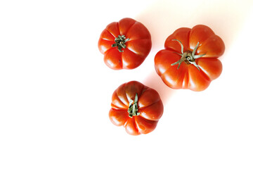 Wall Mural - red big tomato on white isolated background