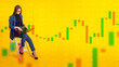 © Grispb - Woman financial analyst. Girl investor with laptop. Businesswoman sitting on high chair. Financial analyst on yellow background. Woman studies stock market statistics. Economic charts near financier