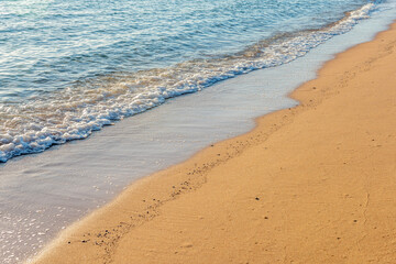 Wall Mural - Wave of the sea on the sand beach