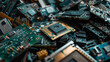 © LaurieCu - A detailed image of a pile of broken electronic circuits and components
