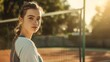 © Joyce - A young female tennis player who loves outdoor activity in tennis court at dawn