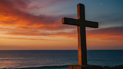 Silhouetted Christian cross against a serene ocean sunset backdrop