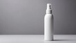 © sitifatimah - A plain white cosmetic spray bottle on a gray background, minimalist style