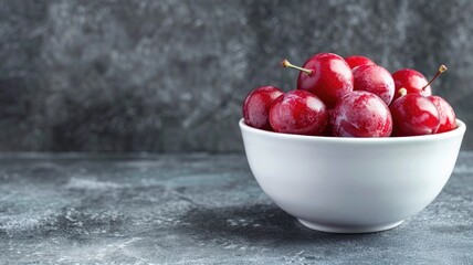Wall Mural - Fresh red cherries in white bowl on rustic surface