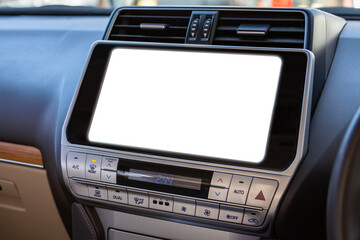 Wall Mural - Close-up of a car panel with a white monitor for design, radio, player and control buttons.