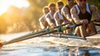 © nopommajun - An intense moment captured of a rowing team in action during a golden hour