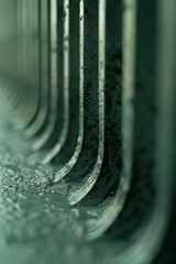 Leinwandbilder - A close-up of parallel lines creating wave patterns, with a soft gradient moving from light grey to charcoal,