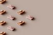 © Westend61 - 3D render of rows of e-mail icons lying against brown background