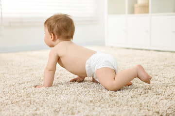 Canvas Print - Baby boy crawling on carpet at home