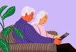 © Westend61 - Elderly couple sharing tablet and sitting on sofa against purple background