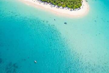 Wall Mural - Aerial view of a tropical beach with turquoise water