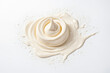 © Rysak - Creamy swirl of yogurt on white background