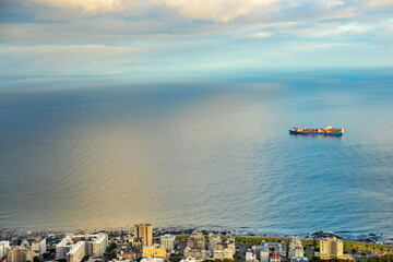 Wall Mural - Cargo container ship off the coast of Cape Town, South Africa